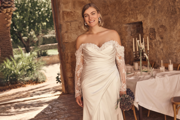 Plus size wedding dress by Modeca Silhouette